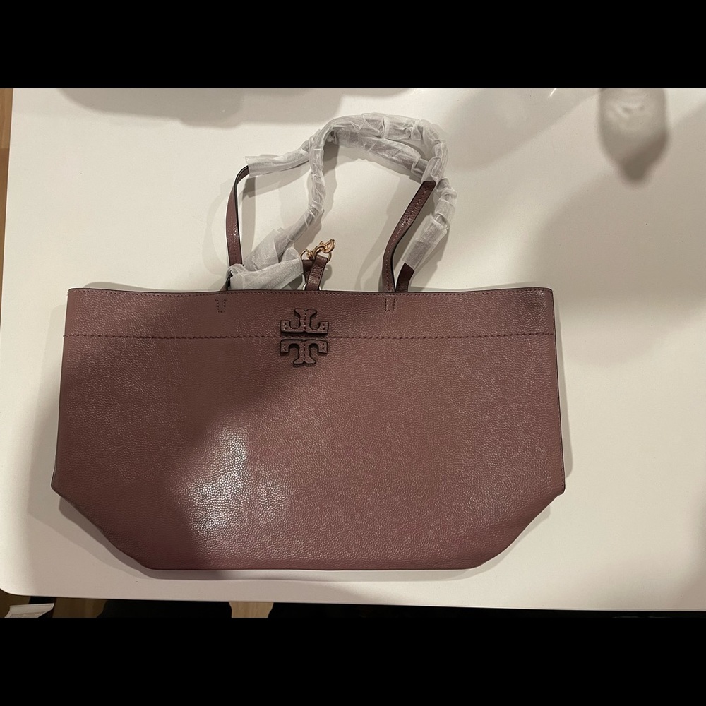 New, never worn Tory Burch bag…handles/straps still protected.